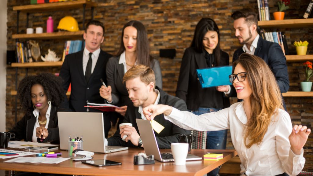 a bustling media agency full of people